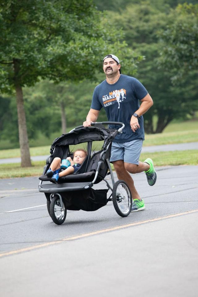 Man running with stroller